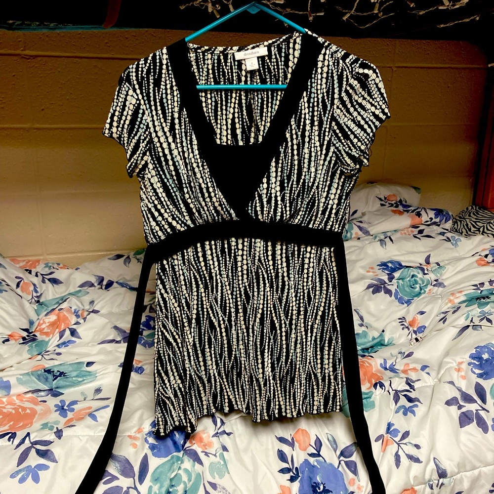 Blouse with covered v-neck